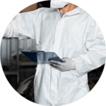 A man wearing a white coverall