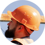 A construction worker wearing an orange hard hat