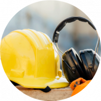 Protective equipment: a helmet, hearing protection headphones, and gloves.
