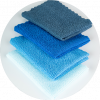 A pile of blue microfiber cloths used for cleaning and dusting