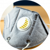 Close-up of a gray KN95 respirator mask with exhalation valve